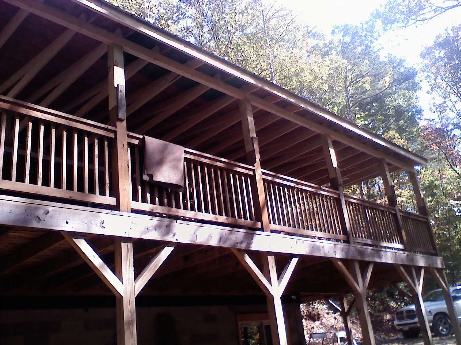 Timber framing under a new elevated porch and deck — Roof Leak Repair in Humphrey by Roofing Brothers